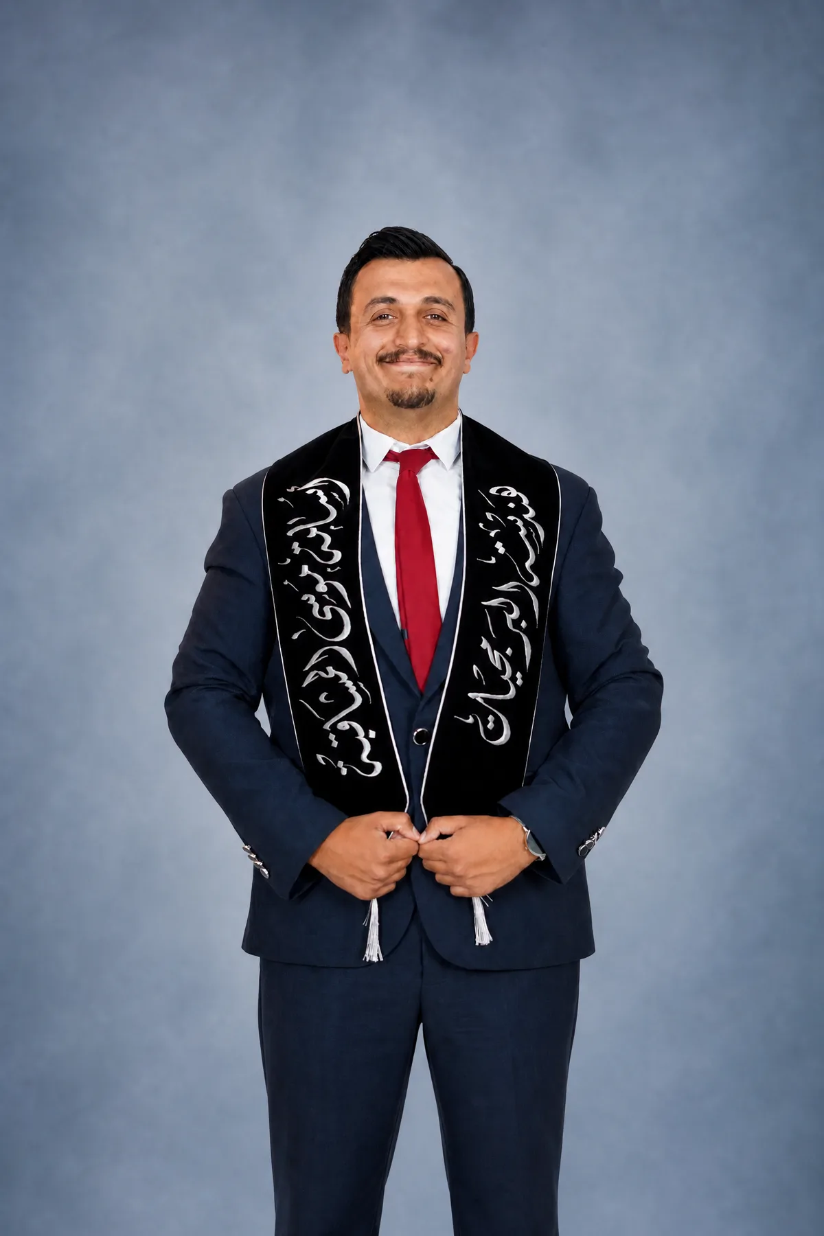 Osama Mousa Almashaqbah in his graduation portrait